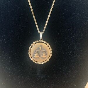 Gold Colored Libra Pendant Necklace